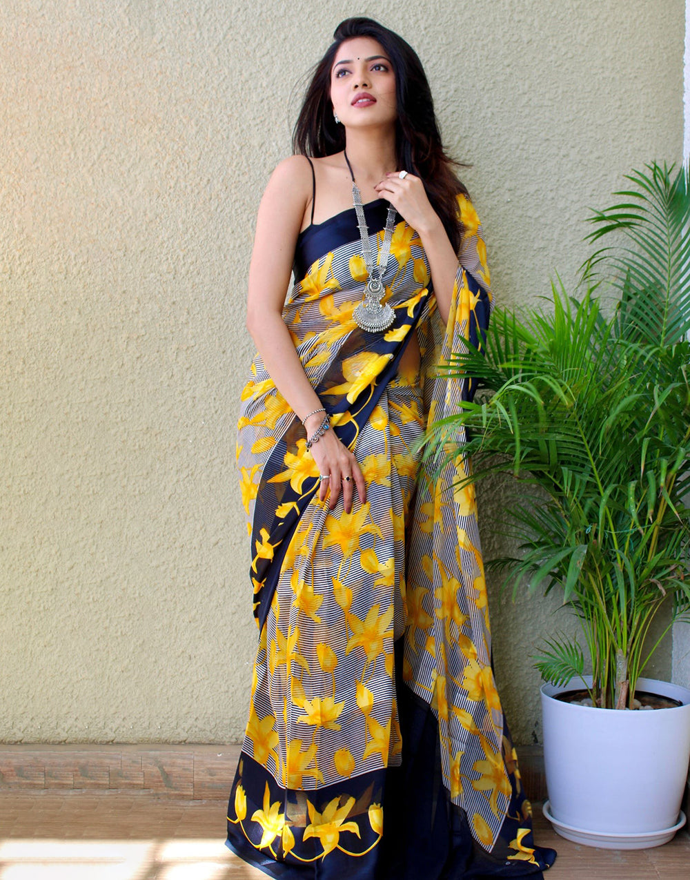 Yellow And Black Georgette Printed Saree