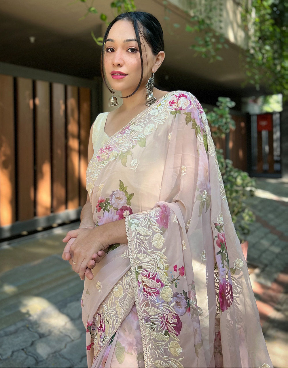 Light Peach Georgette Printed Saree With Embroidery Work & Lace Border