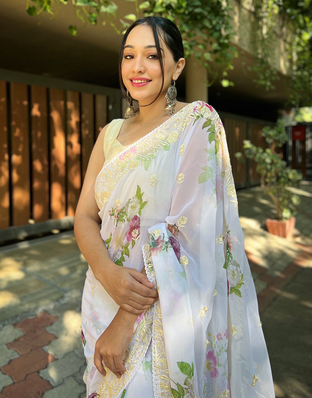 White Georgette Printed Saree With Embroidery Work & Lace Border