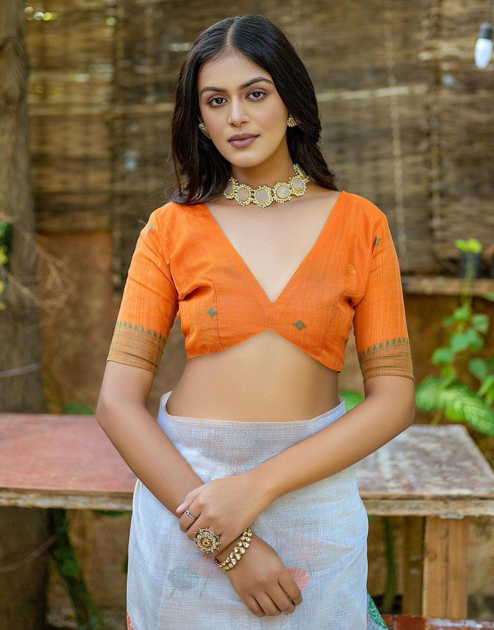 Orange Soft Muga Silk Saree With Floral Weaving Work