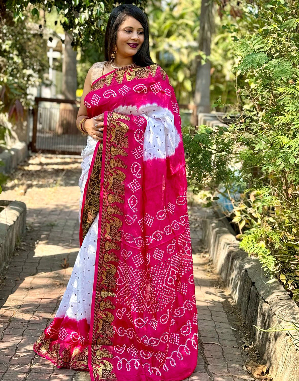 Rani Pink Bandhani Saree With Printed & Weaving Border