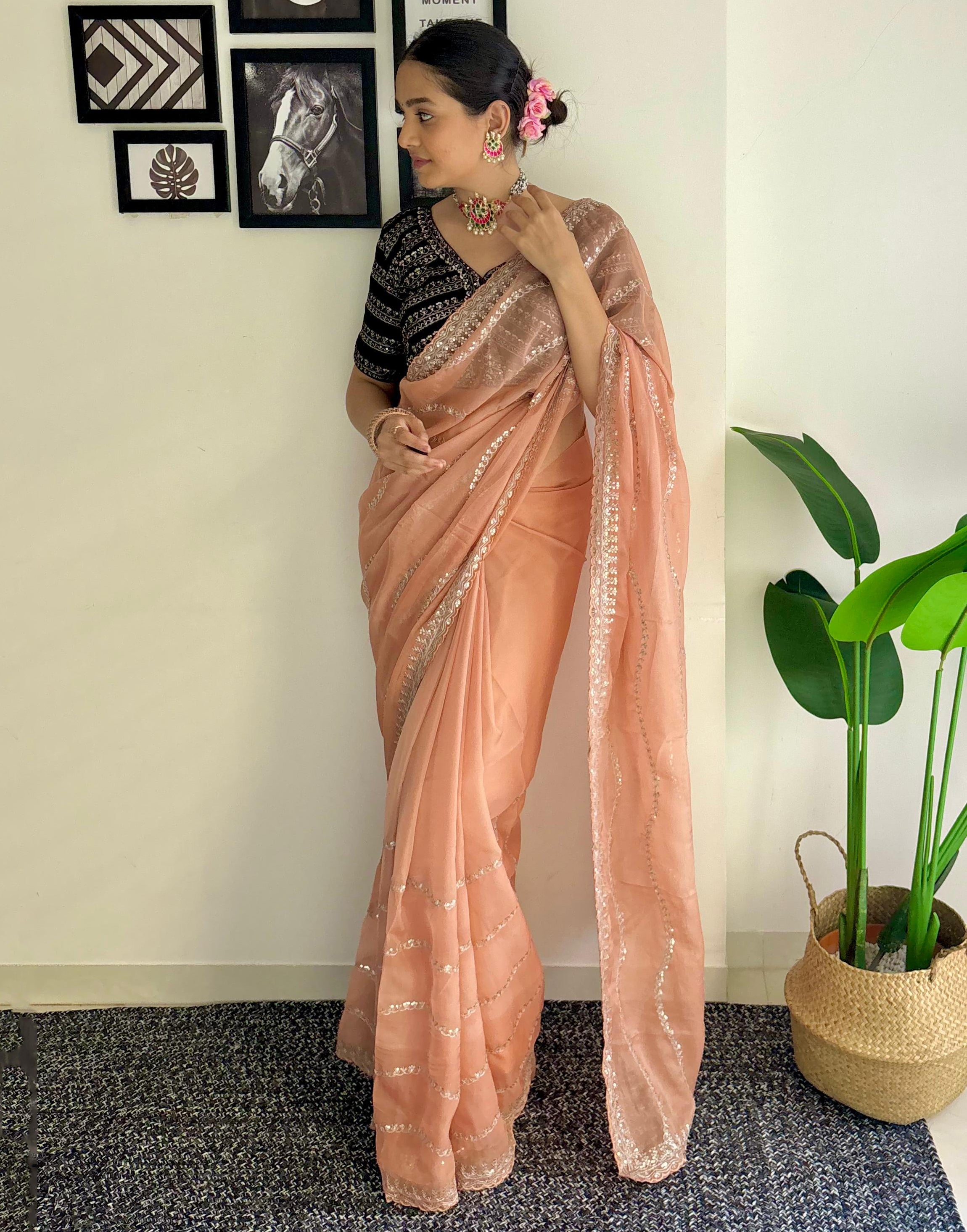 Creamy Peach Organza Saree With Zari & Sequence Work