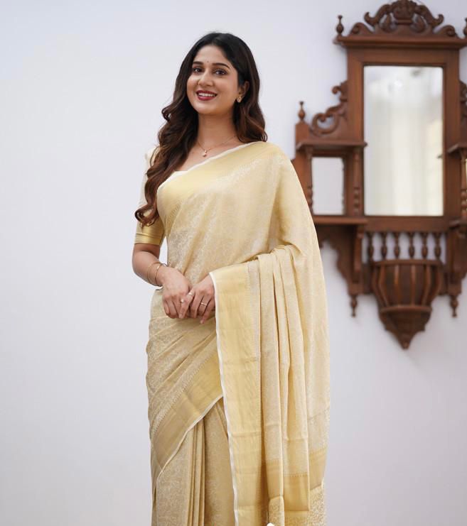 Cream Soft Lichi Silk Saree With Weaving Work