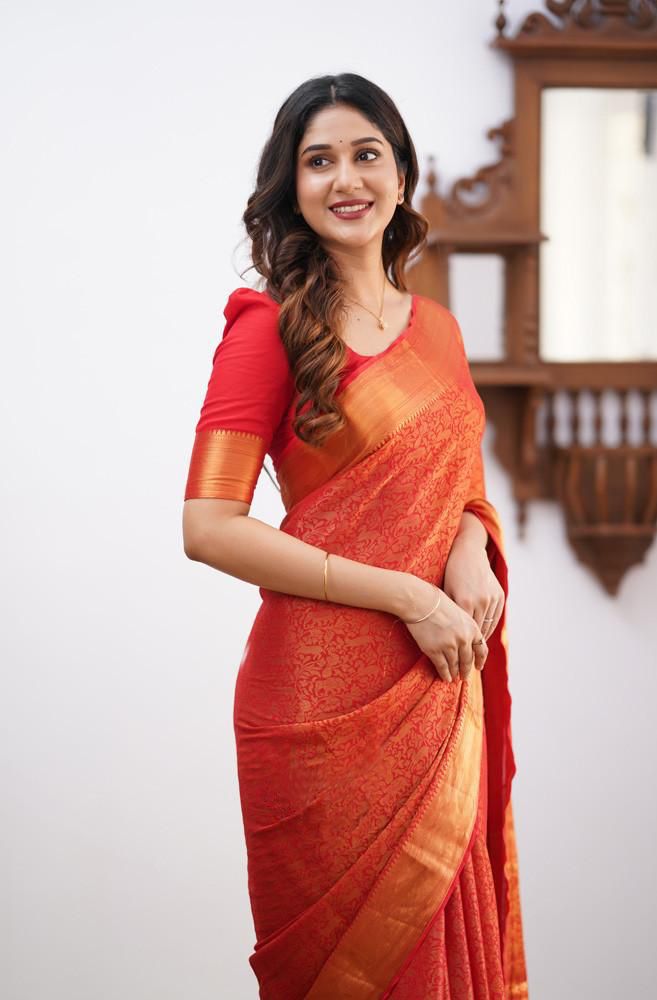 Orange Soft Lichi Silk Saree With Weaving Work