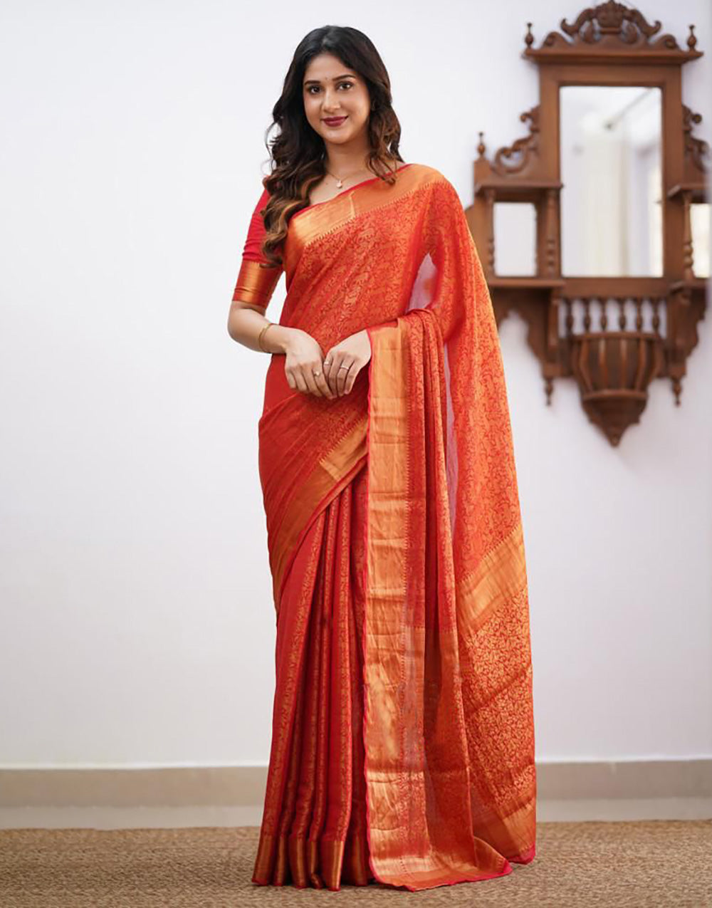 Orange Soft Lichi Silk Saree With Zari Weaving Work