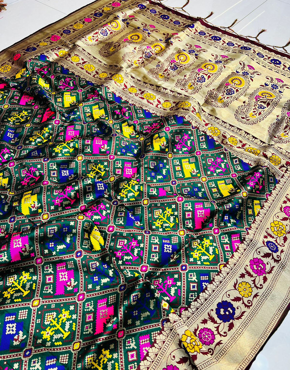 Bottle Green Soft Patola Silk Saree With Zari Weaving Work
