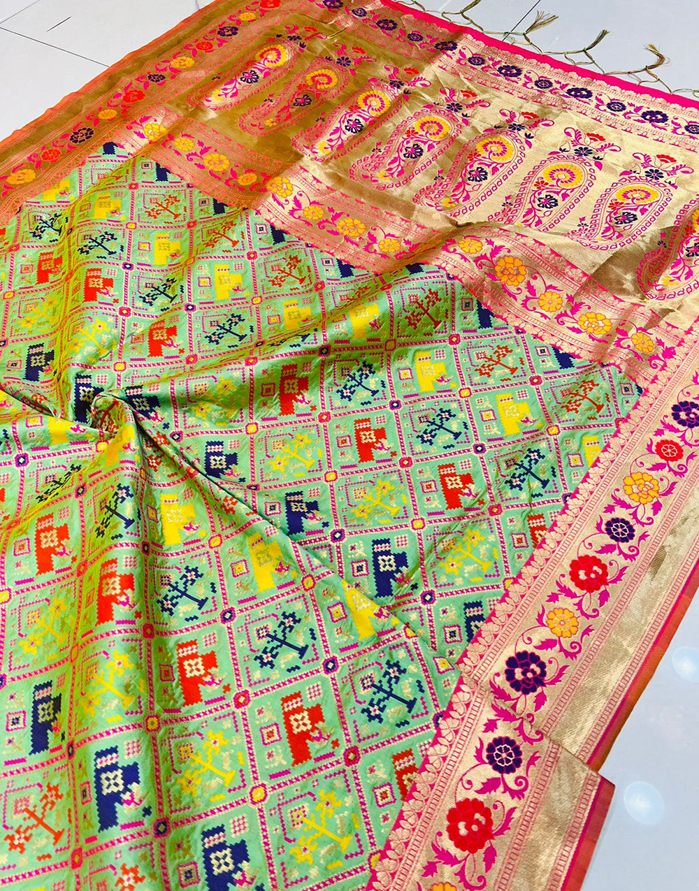 Mint Green Soft Patola Silk Saree With Zari Weaving Work