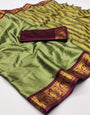 Olive Green Silk Saree With Zari Weaving Work
