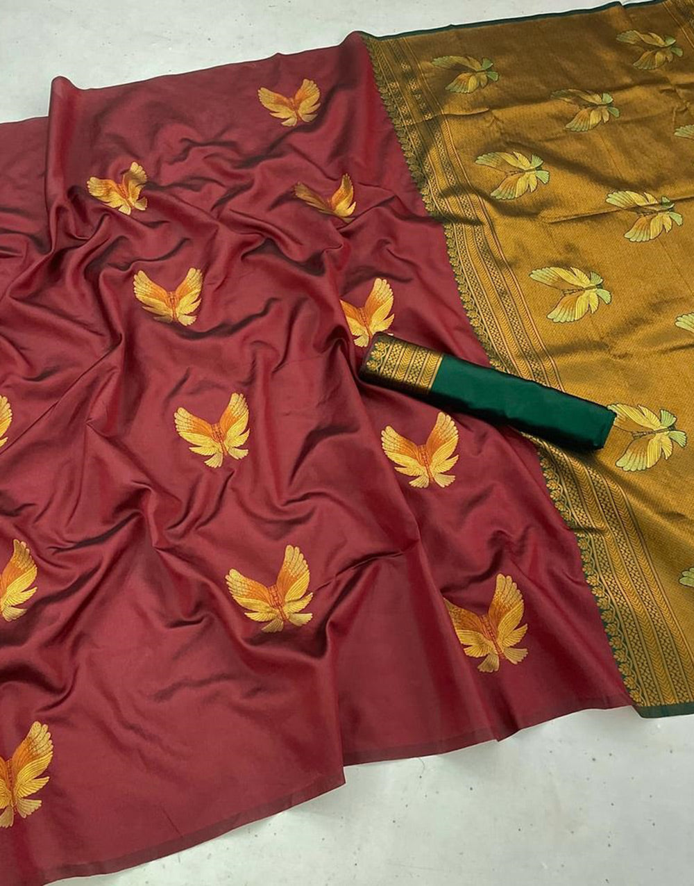 Maroon Soft Silk Saree With Zari Weaving Work