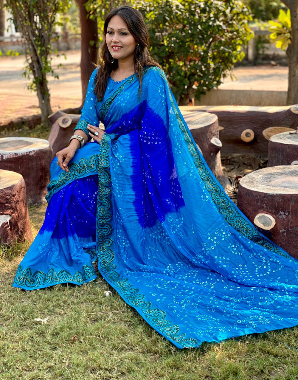 Firozi & Blue Bandhej Saree With Zari Waving Work