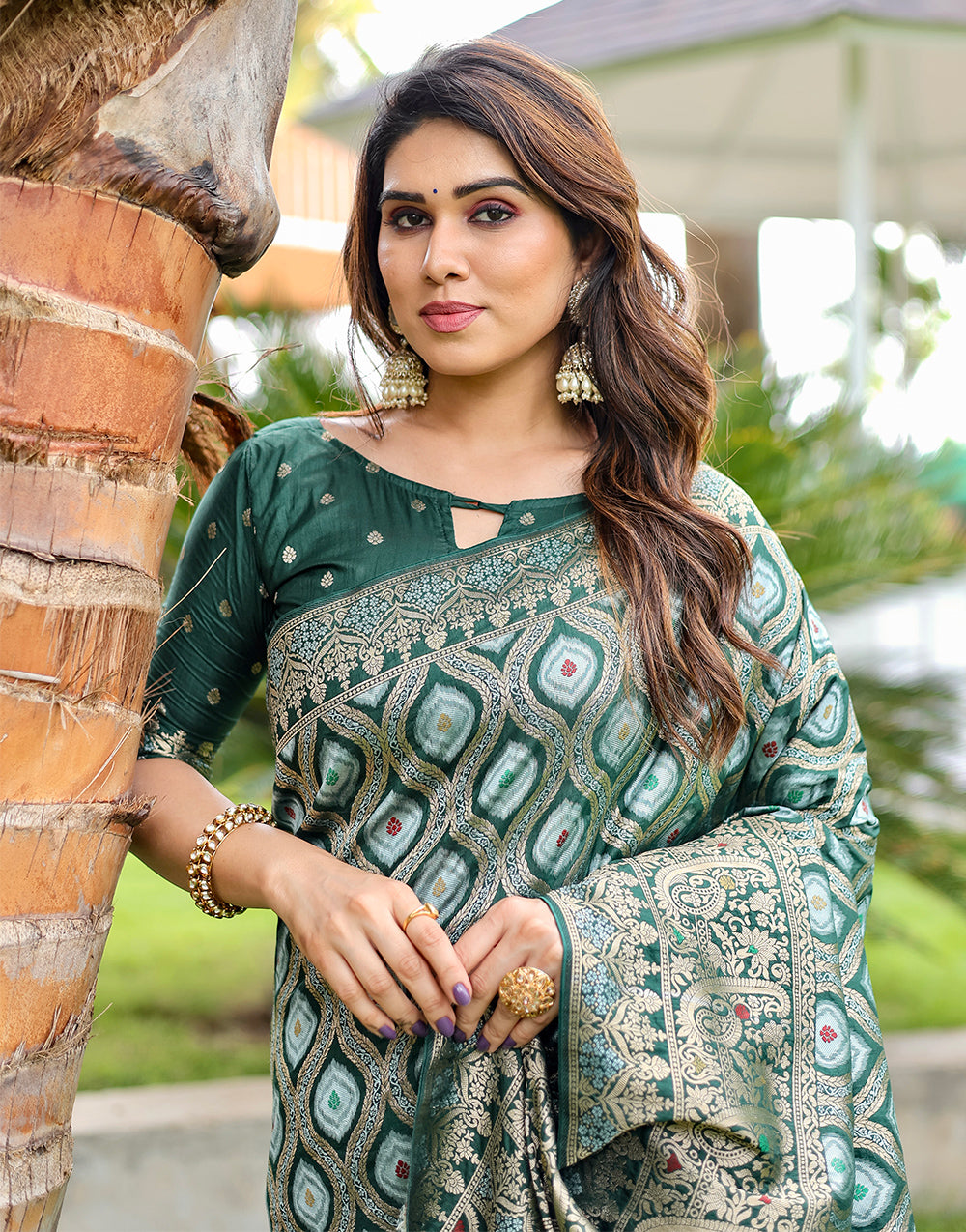 Dark Green Kanjivaram Silk Saree With Zari Weaving Work