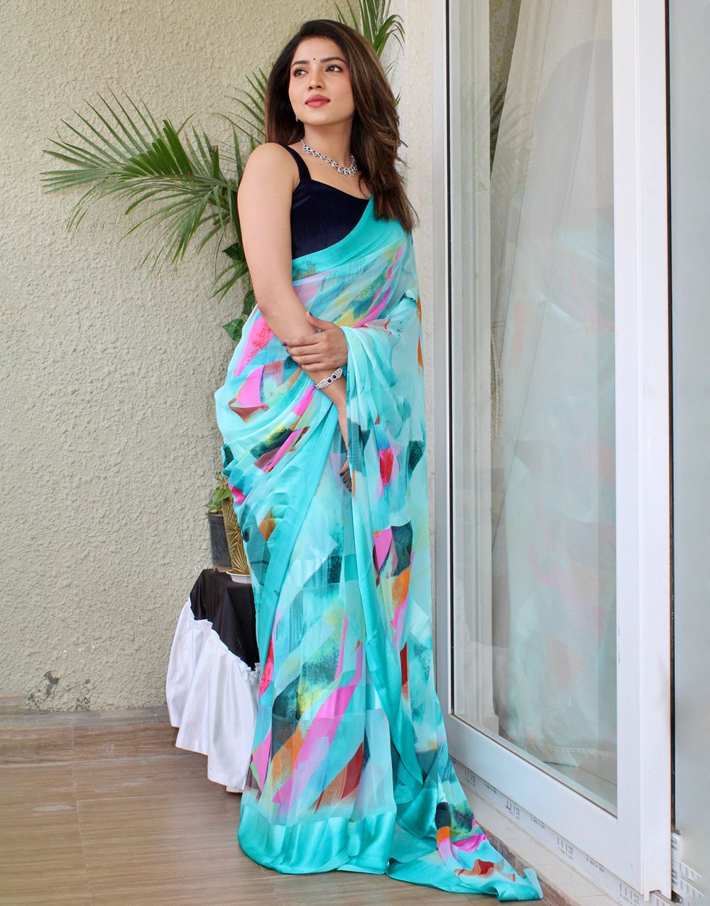 Sky Blue Georgette Printed Saree With Satin Patta