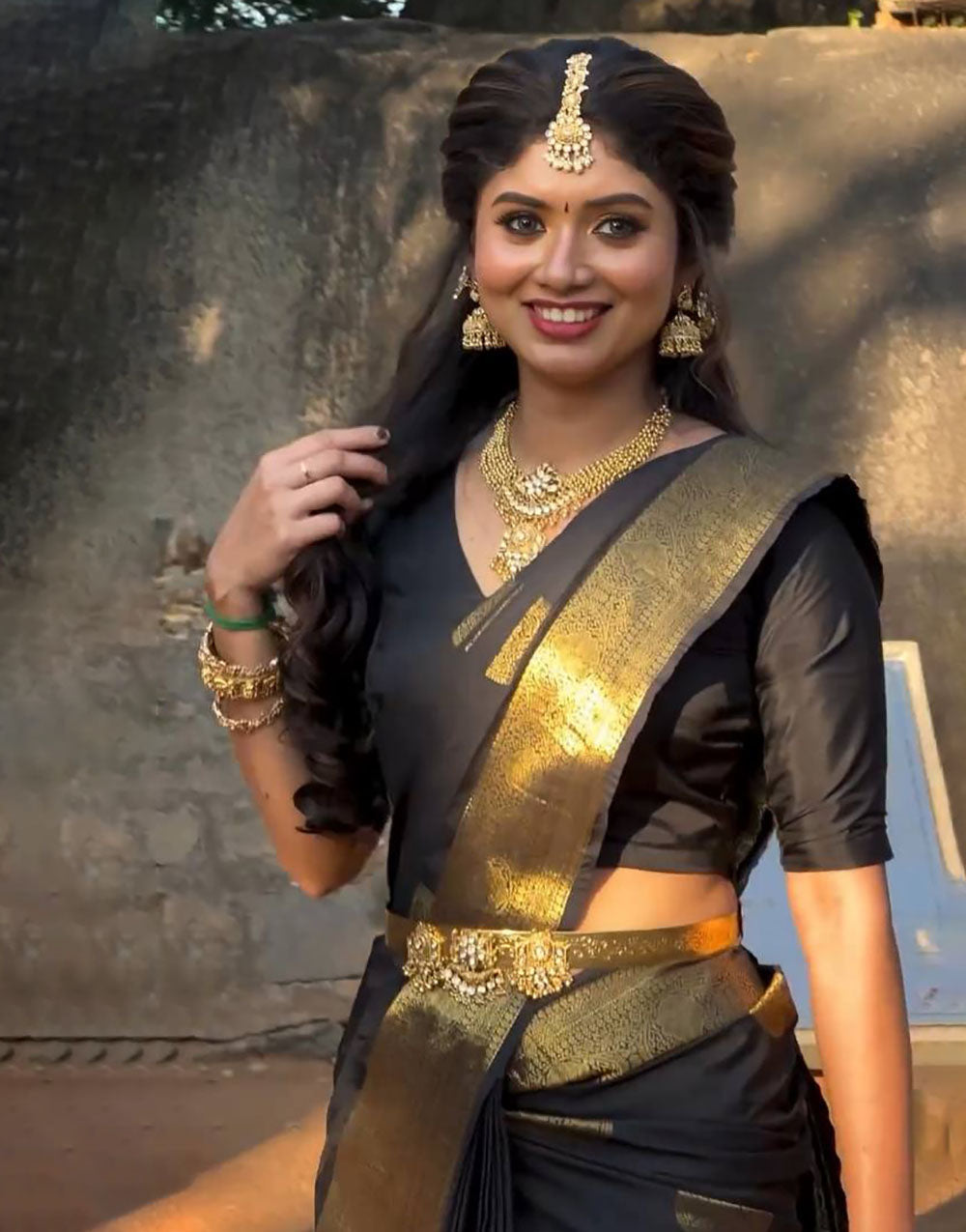 Black Soft Lichi Silk Saree With Gold Zari Weaving Work