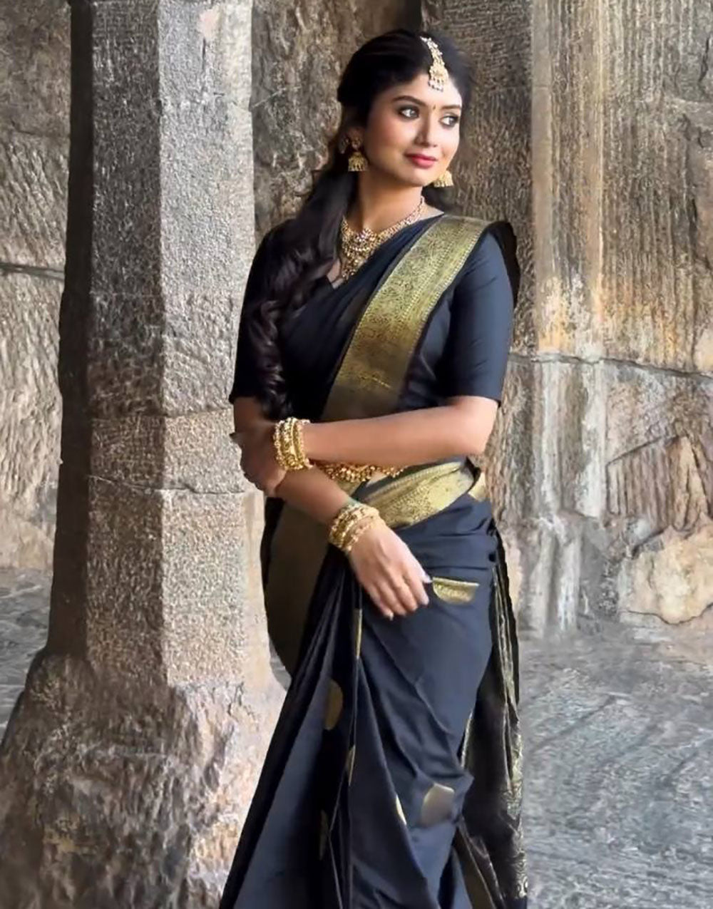 Black Soft Lichi Silk Saree With Gold Zari Weaving Work