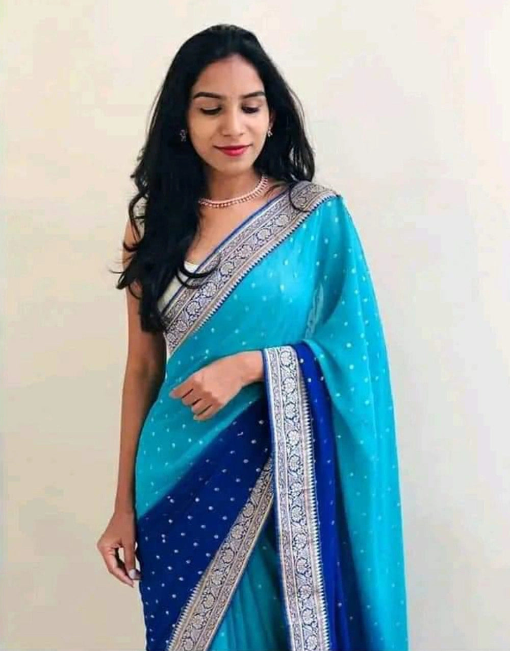 Sky Blue Color  Heavy Georgette Foil Print Saree