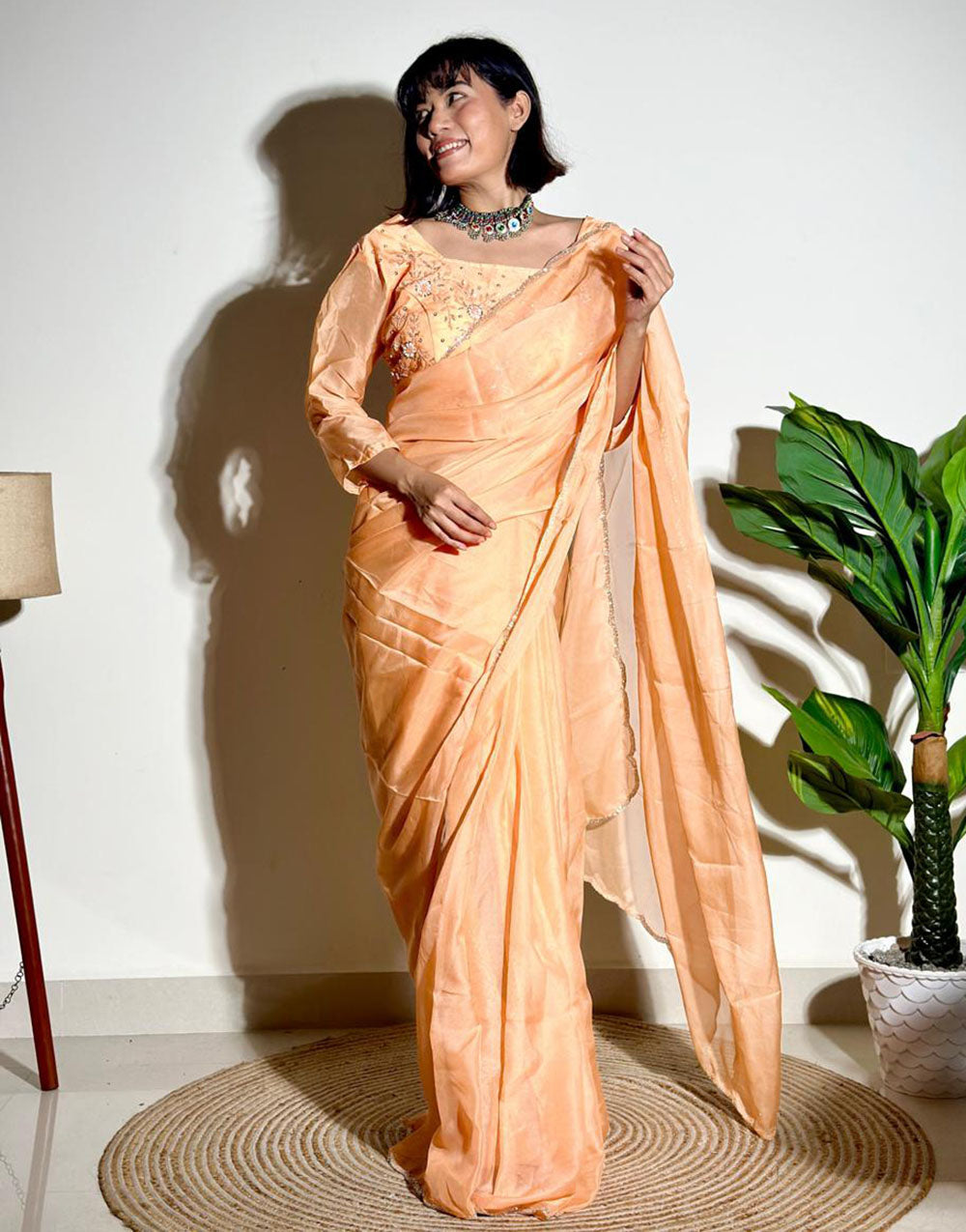 Peach Soft Organza Saree With Embroidery Arco Cutwork Border