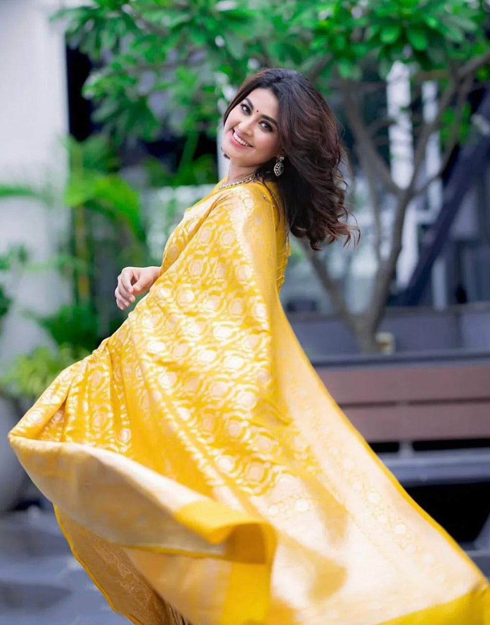 Yellow Banarasi Soft Silk Saree With Zari Weaving Work