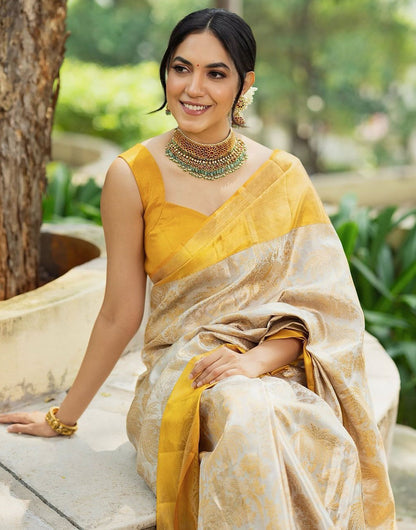 Cream & Yellow Banarasi Soft Silk Saree With Zari Weaving Work