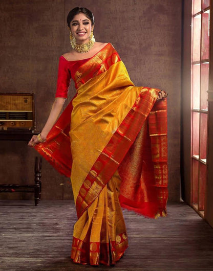 Yellow & Red Banarasi Silk Saree With Zari Weaving Work