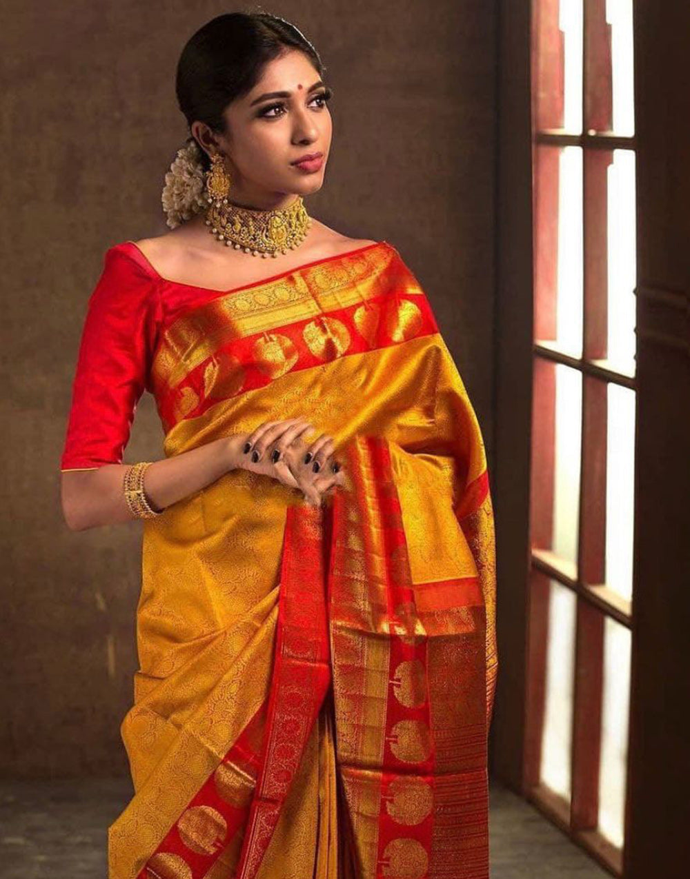 Yellow & Red Banarasi Silk Saree With Zari Weaving Work