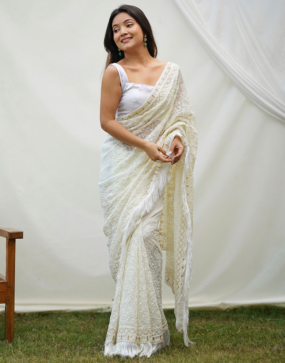 Off White Georgette Saree With Embroidery Work & Frill Lace Border