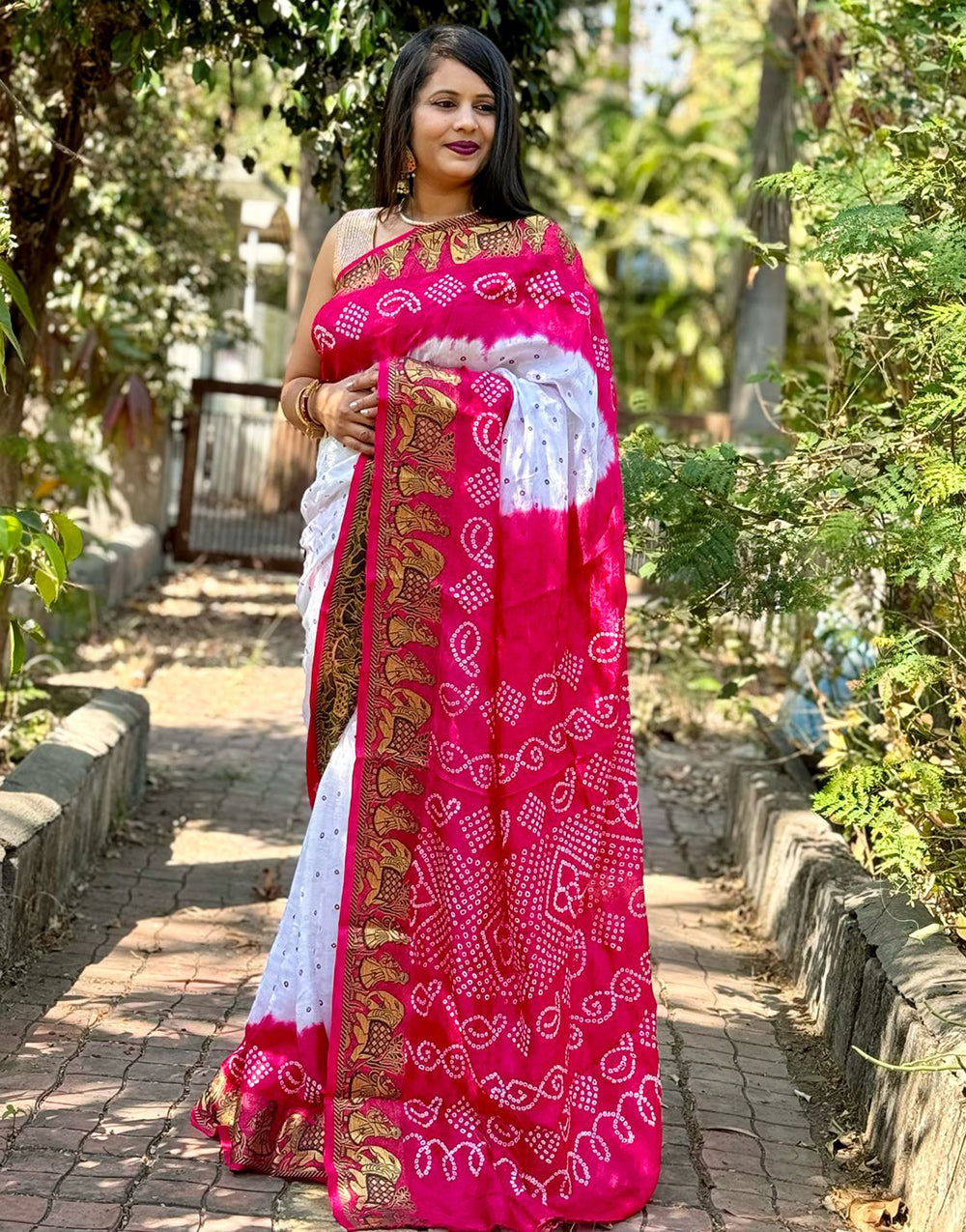 Rani Pink Bandhani Saree With Printed & Weaving Border