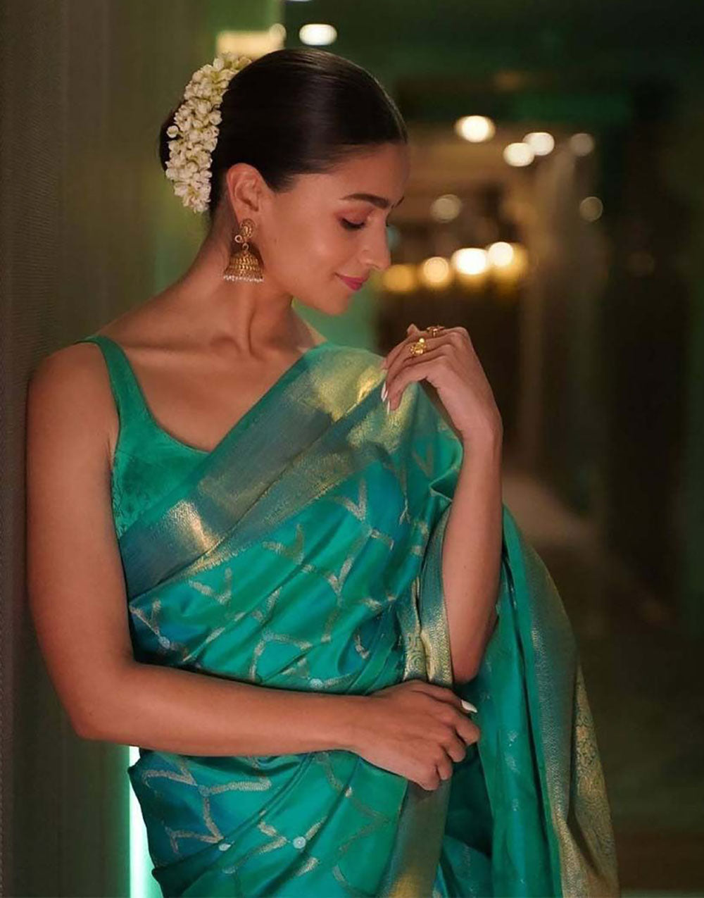 Jungle Green Soft Silk Saree With Zari Weaving Work