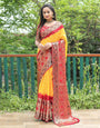 Yellow & Candy Red Bandhani Saree With Zari Weaving Work