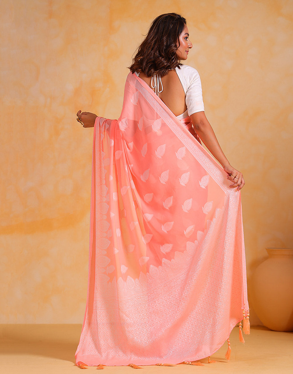 Peach Pink Georgette Saree With Silver Soft Weaving Work