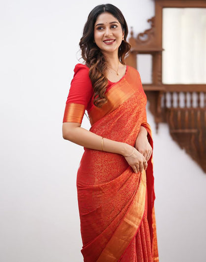 Orange Soft Lichi Silk Saree With Zari Weaving Work