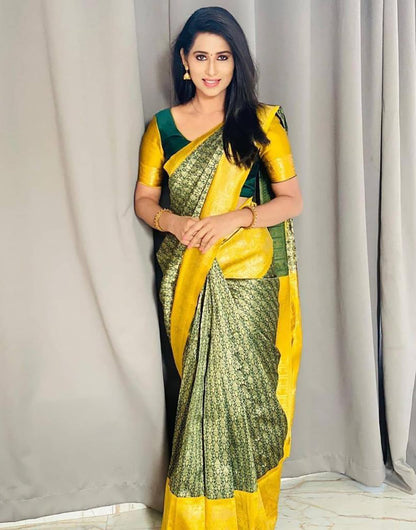 Yellow & Green Soft Lichi Silk Saree With Zari Weaving Work