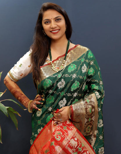 Dark Green Patola Silk Saree With Zari Weaving Work