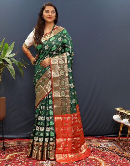 Dark Green Patola Silk Saree With Zari Weaving Work