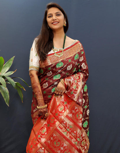 Royal Maroon Patola Silk Saree With Zari Weaving Work