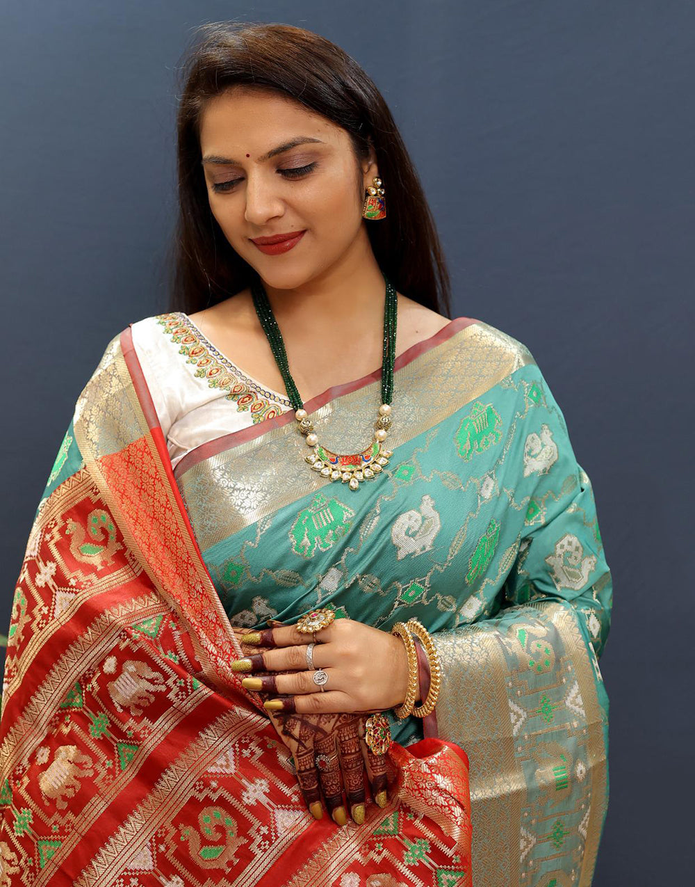 Mint Green Patola Silk Saree With Zari Weaving Work