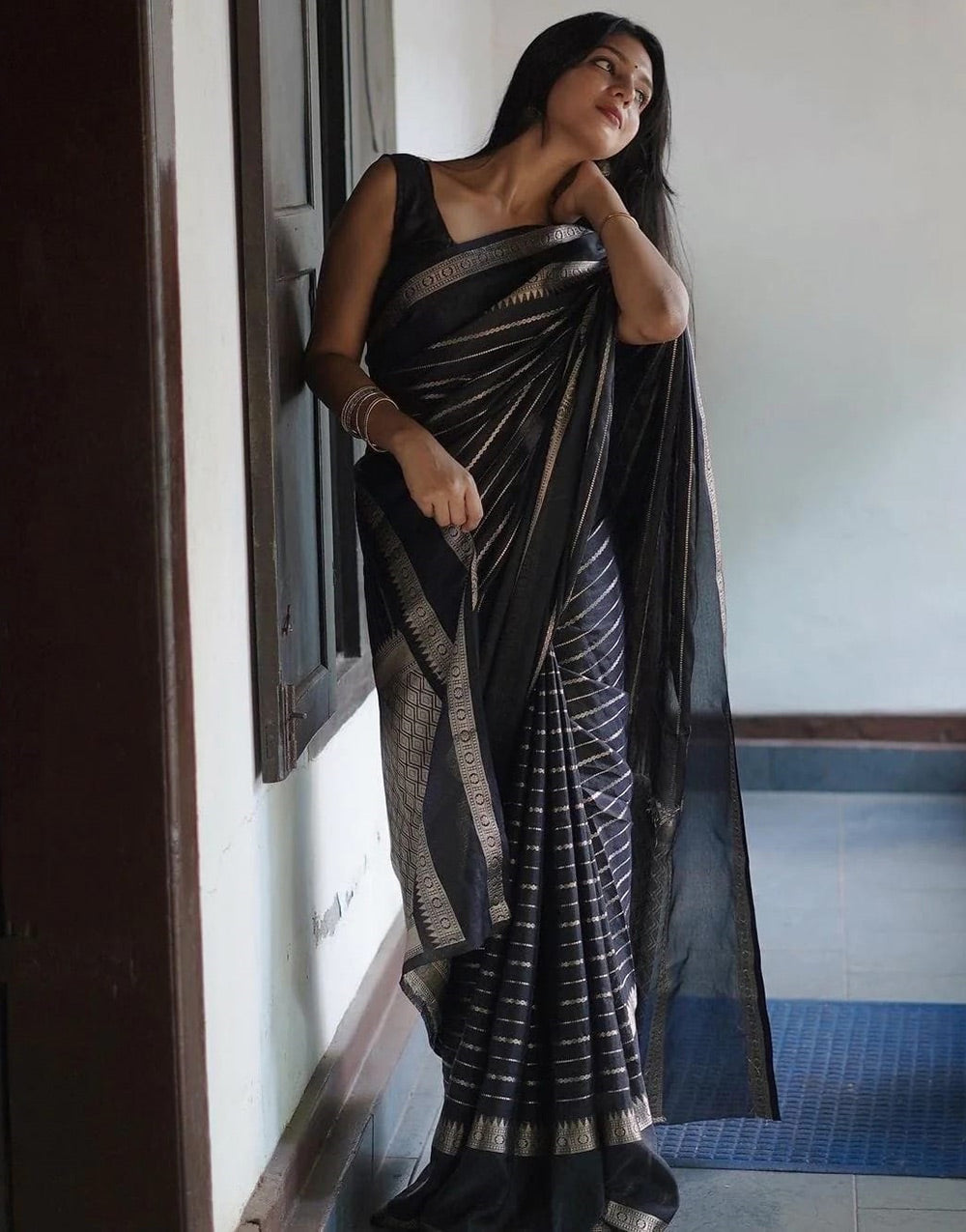 Black Soft Lichi Silk Saree With Zari Weaving Work