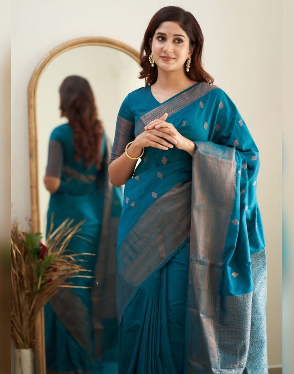 Teal Blue Soft Silk Saree With Zari Weaving Work