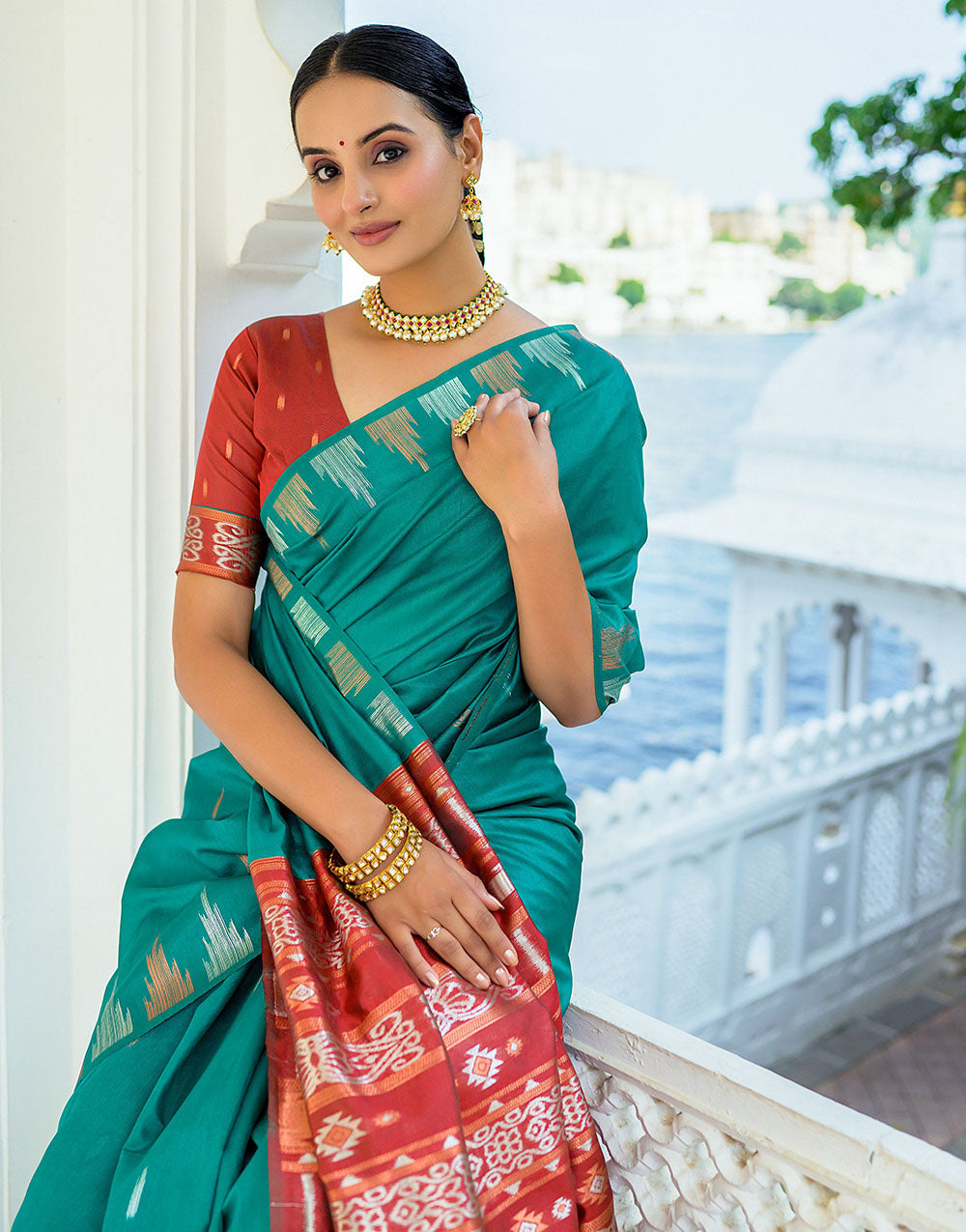 Teal Green Soft Tussar Silk Saree With Zari Weaving Work