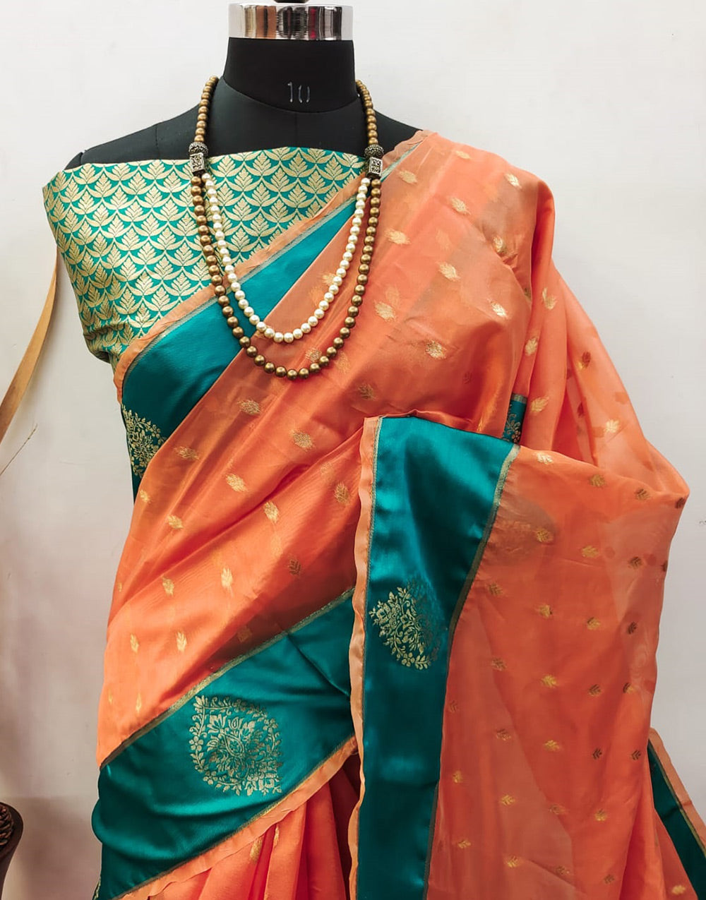Light Orange Linen Silk Saree With Zari Weaving Work