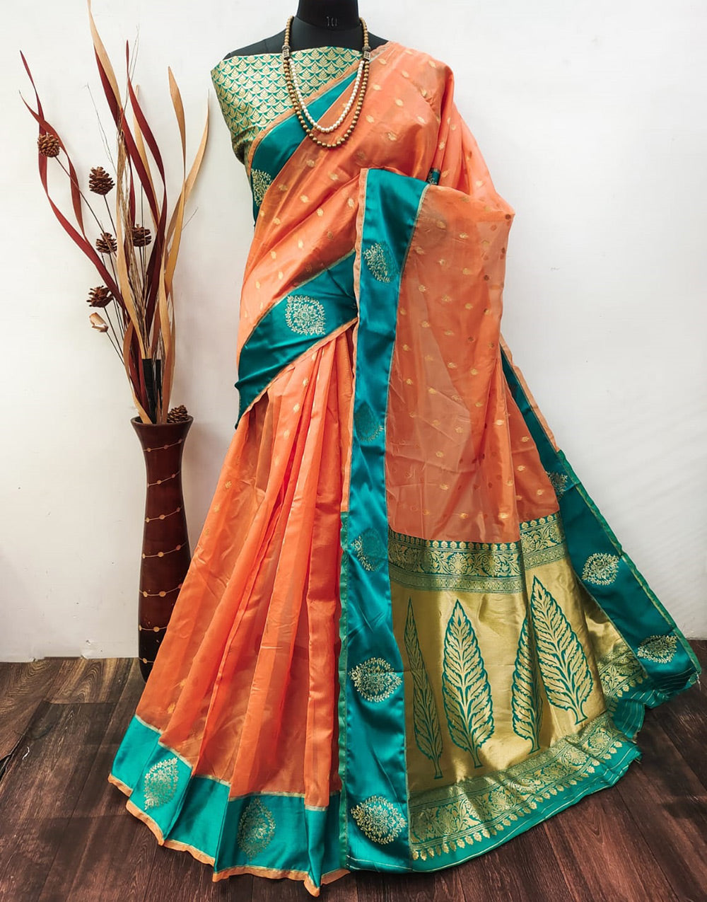 Light Orange Linen Silk Saree With Zari Weaving Work