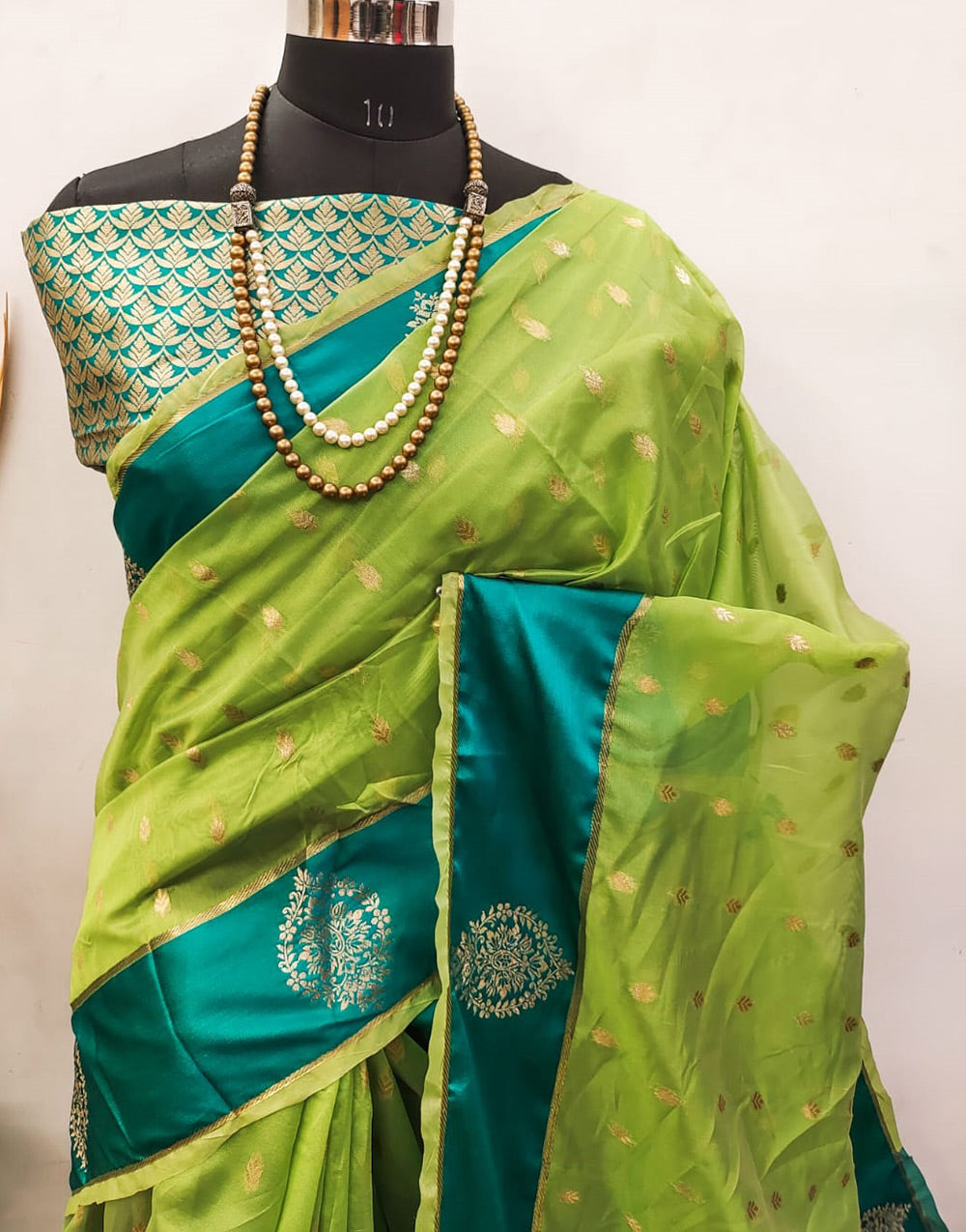 Parrot Green Linen Silk Saree With Zari Weaving Work