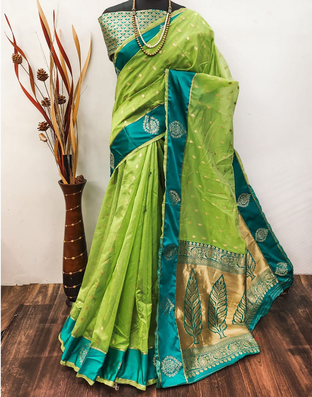 Parrot Green Linen Silk Saree With Zari Weaving Work