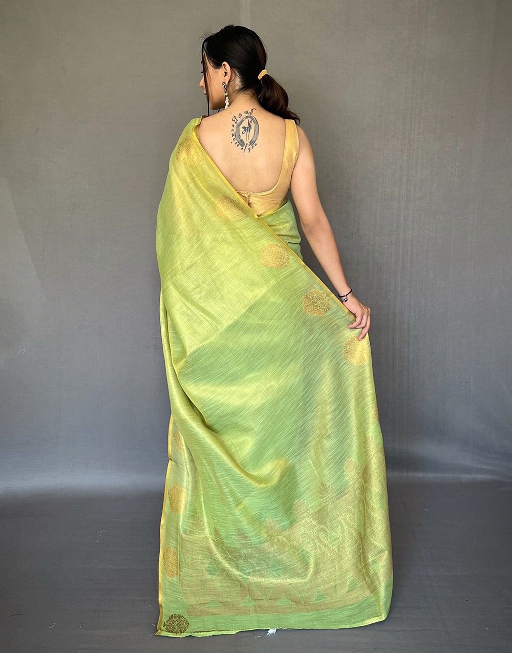 Lime Green Tissue Silk Saree With Zari Weaving Work