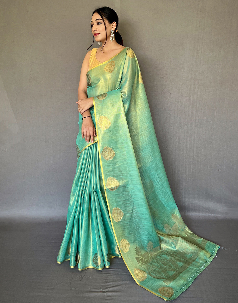 Mint Green Tissue Silk Saree With Zari Weaving Work