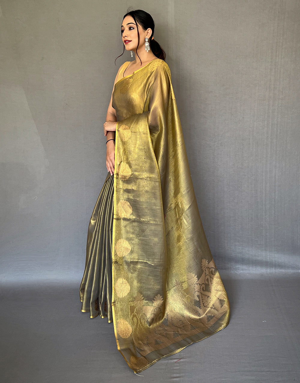 Olive Green Tissue Silk Saree With Zari Weaving Work