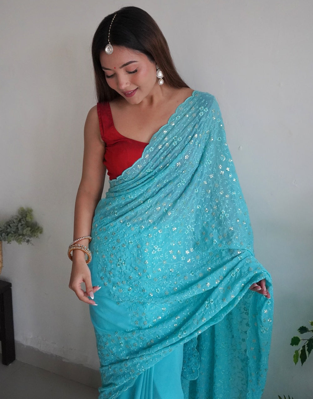 Sky Blue Georgette With Sequence Work  & Piping Border