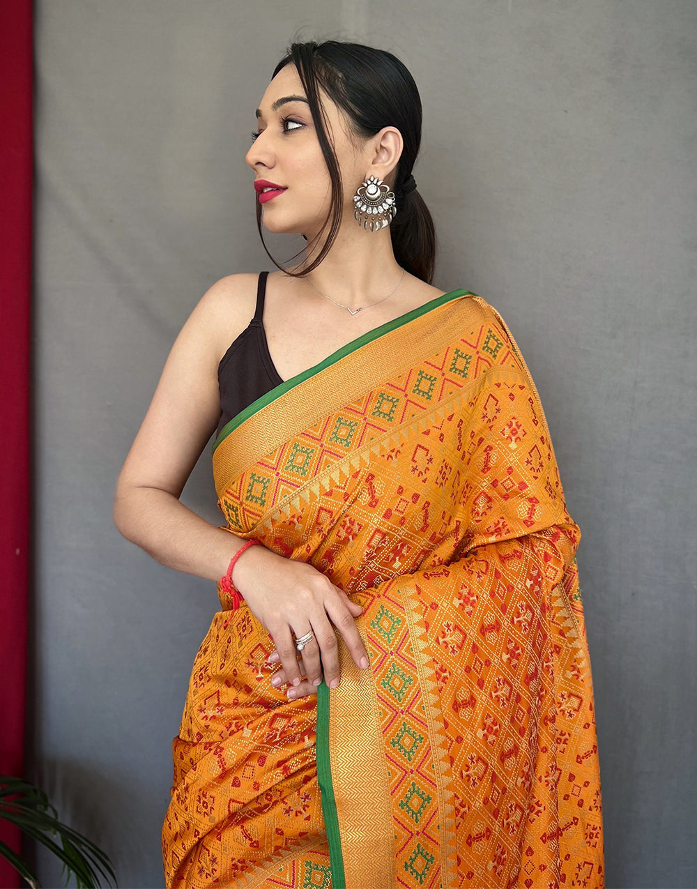 Mustard Yellow Patola Silk Saree With Weaving Work