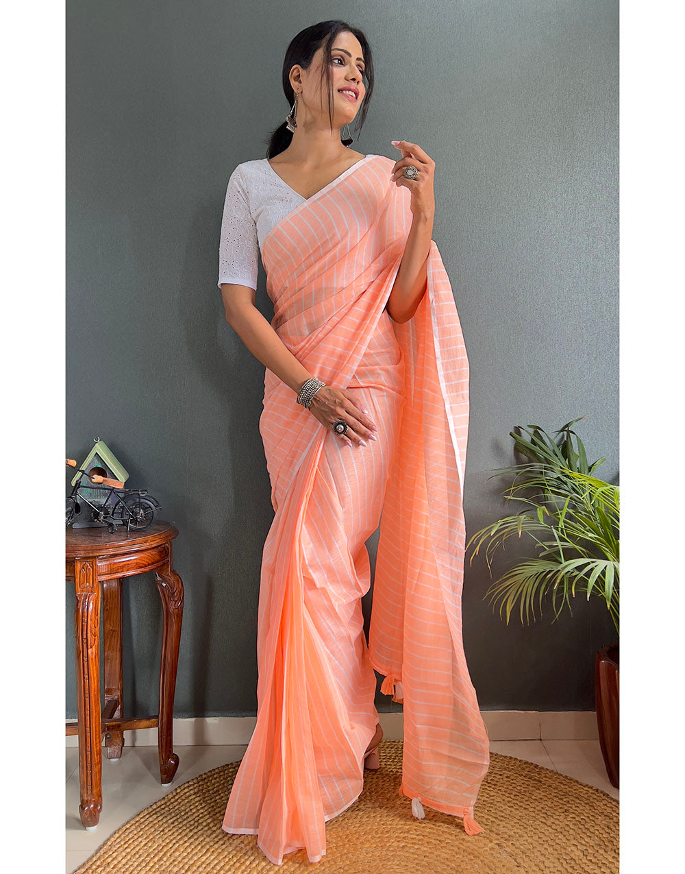 Cantaloupe Orange Cotton Striped Saree With Tassels On Pallu