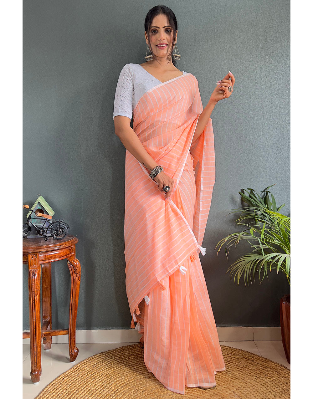 Cantaloupe Orange Cotton Striped Saree With Tassels On Pallu