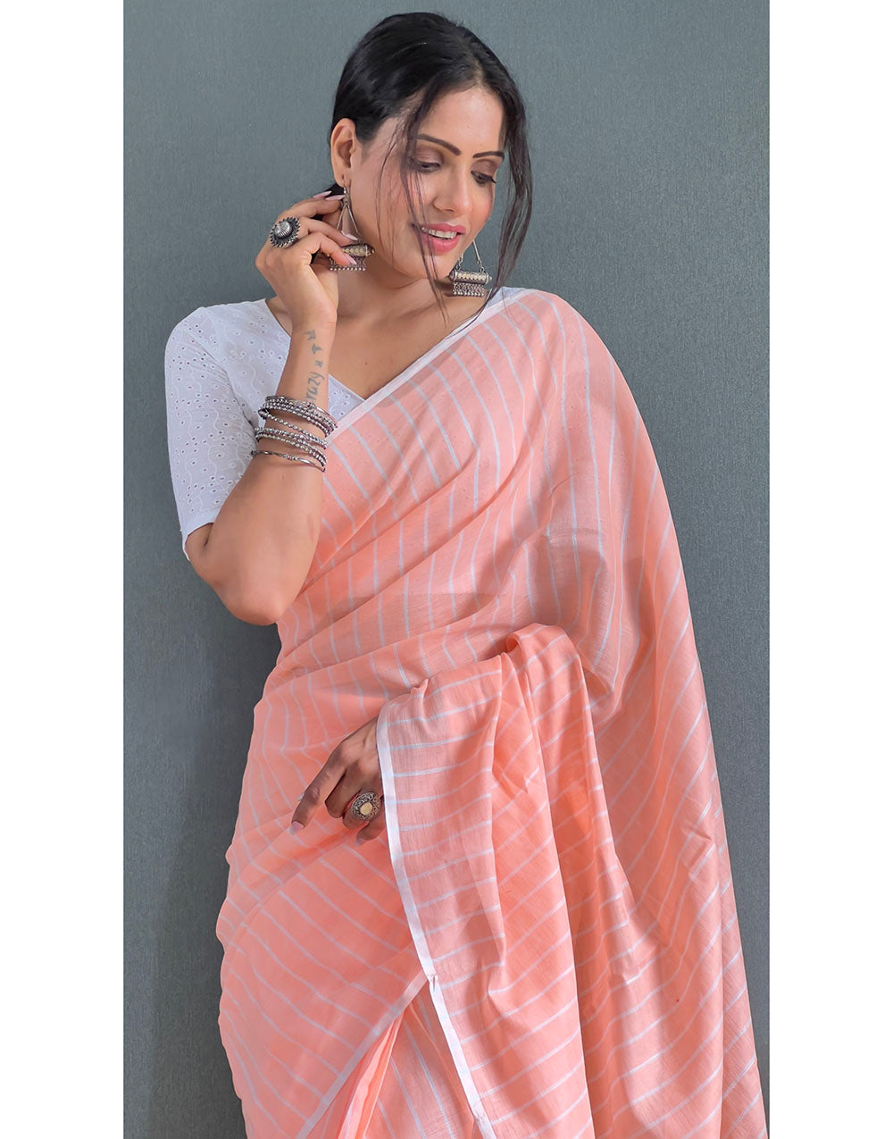 Cantaloupe Orange Cotton Striped Saree With Tassels On Pallu